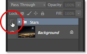 Clicking the Stars layer group\'s visibility icon. Image © 2013 Photoshop Essentials.com